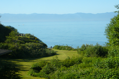 View of private beach from main level balcony